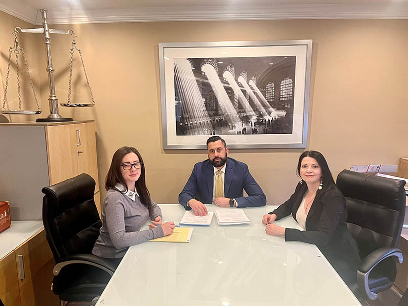 Eviction lawyer consulting with client to review eviction notice and tenant rights.